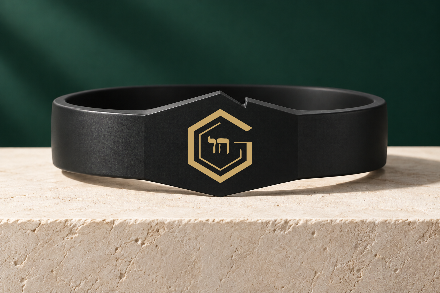 Product concept of the Protect wristband, a broad black architectural cuff with the gold G and Chai.