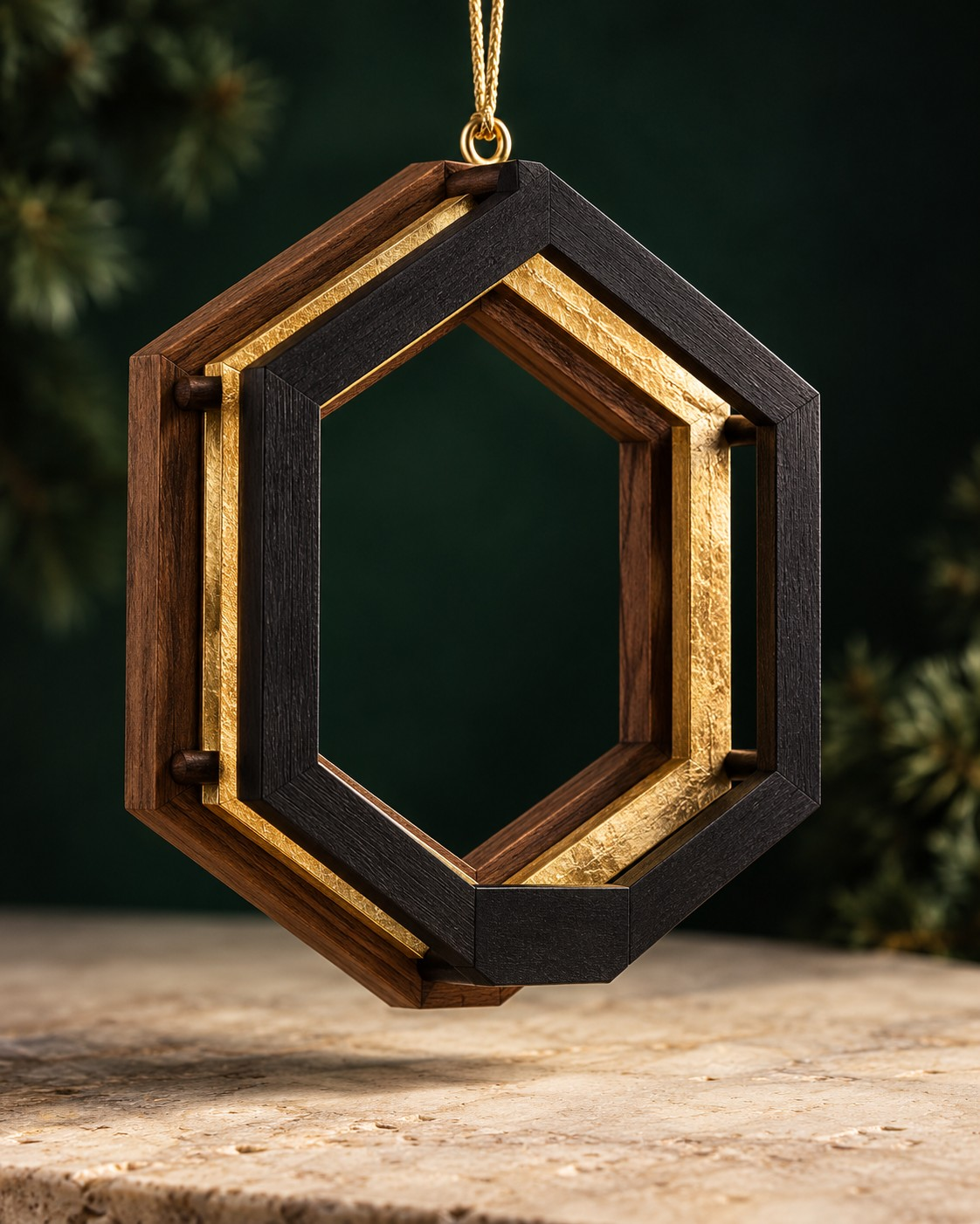 Early Open Interval ornament concept: three open hexagonal wood-tone, dark and gold frames suspended by a cord. Not a finished-stock photograph.